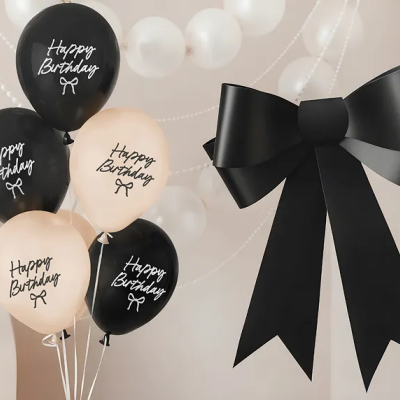 Balões preto e bege Happy Birthday e laço preto decorativo