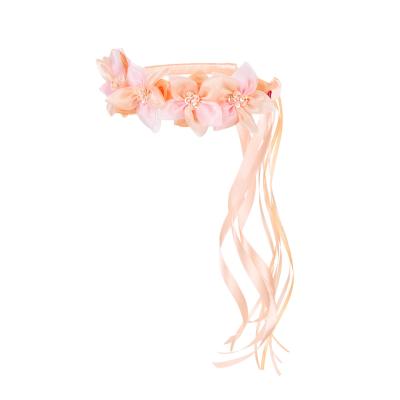 Faixa de cabelo cor de pêssego com flores e fitas decorativas