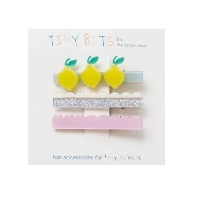 Conjunto de presilhas de cabelo para bebés com decoração de limões, glitter e cor-de-rosa em cartão branco.