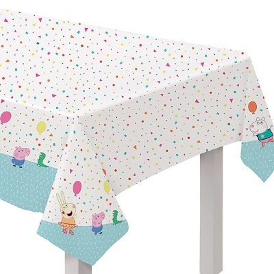 Toalha de mesa branca com padrão colorido e personagens de desenhos animados nas bordas azuis.