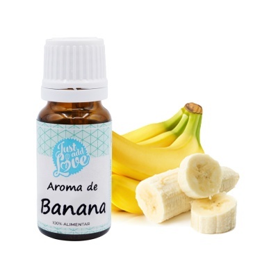 Frasco de aroma de banana ao lado de bananas frescas e fatias.