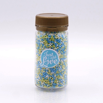 Frasco de bolinhas coloridas para decoração com etiqueta 'Just add Love'