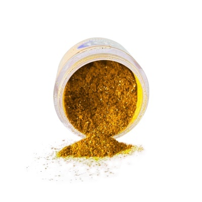 Recipiente plástico com pó amarelo dourado derramado