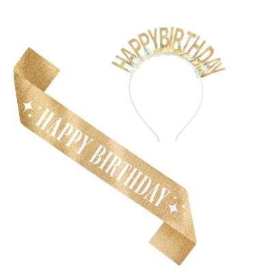 Faixa e tiara douradas com texto HAPPY BIRTHDAY para festa