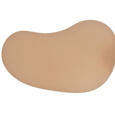 Almofada ergonómica bege com textura suave