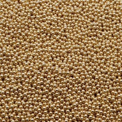 Pequenas esferas douradas brilhantes próximas umas das outras