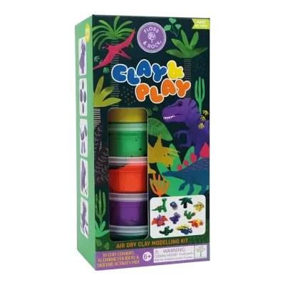Kit de argila para modelar com cores variadas dentro de caixa decorada com ilustrações de dinossauros.