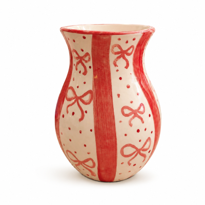 Vaso de cerâmica branco com decoração vermelha de laços e pontos
