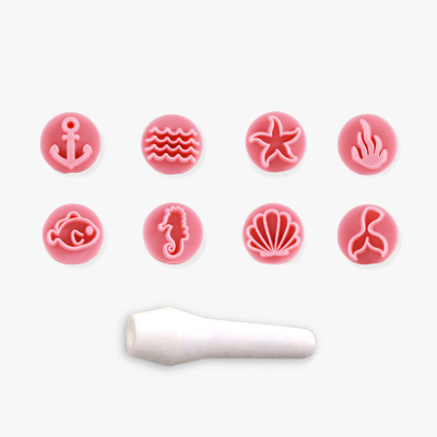 Oito carimbos rosa com motivos marinhos e um cabo branco