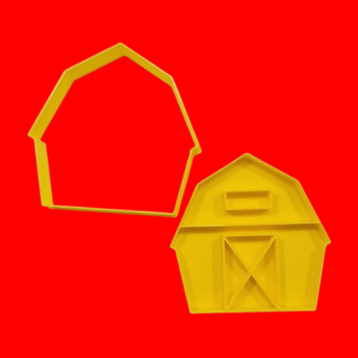 Cortador e marcador amarelo em forma de celeiro para bolachas