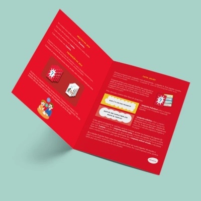 Folheto de instruções de jogo aberto com texto e imagens coloridas