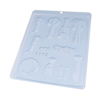 Molde de plástico transparente com formas de instrumentos musicais