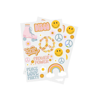 Dois conjuntos de autocolantes coloridos com temas da paz, flores, emojis sorridentes, patins e textos variados em fundo branco.