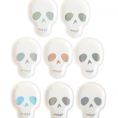 Pratos descartáveis em formato de caveira com olhos holográficos.