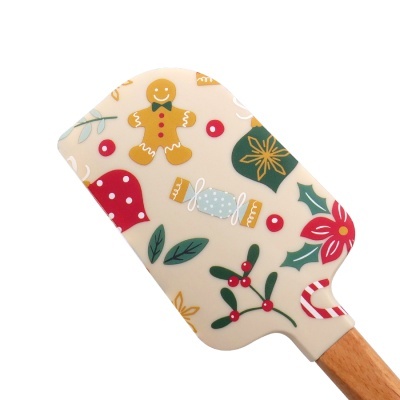 Espátula de cozinha com motivos natalícios coloridos em silicone e cabo de madeira