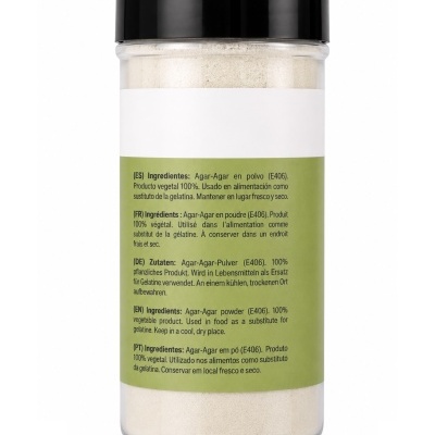 Frasco de pó branco com tampa preta e etiqueta verde e branca com ingredientes
