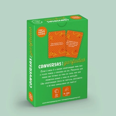Caixa verde do jogo de cartas CONVERSAS entre garfadas com cartas laranja e texto explicativo