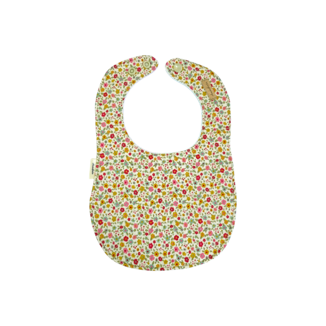 Babete flores de primavera Babete impermeável e com tecido 100% algodão para bebé.