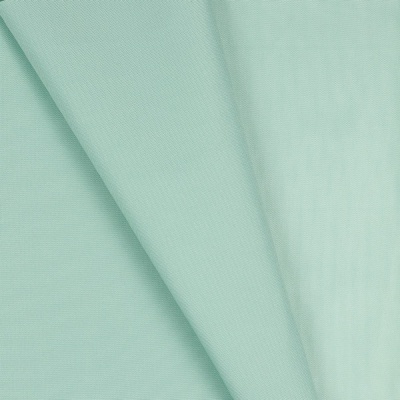 Tecido de algodão verde claro com textura lisa e suave