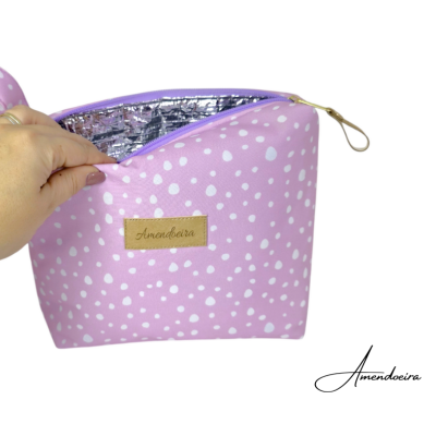 Necessaire cor-de-rosa com manchas brancas e fecho roxo