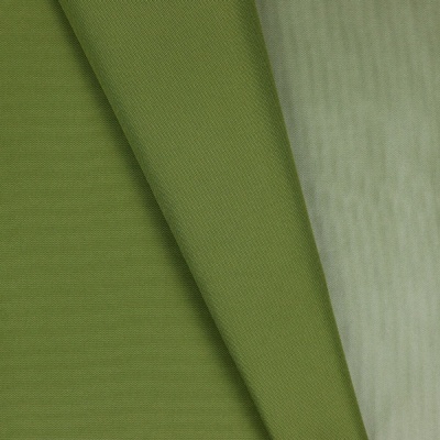 tecido verde dobrado com textura fina