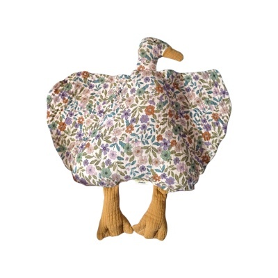 pelúcia em forma de pato com tecido floral colorido e bico amarelo
