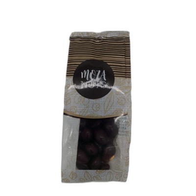 Embalagem clara e castanha com nozes e etiqueta preta MOZA NUTS