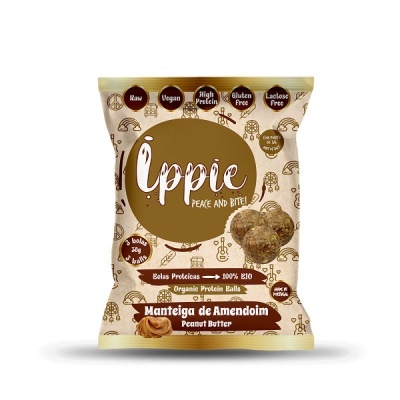 Embalagem creme e castanha de bolinhas proteicas de manteiga de amendoim Ippie