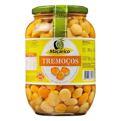 Frasco de vidro com tremoços amarelos Maçarico