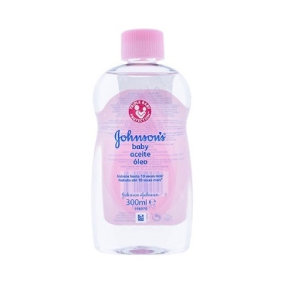 Frasco de óleo Johnson's Baby com tampa rosa e rótulo cor-de-rosa
