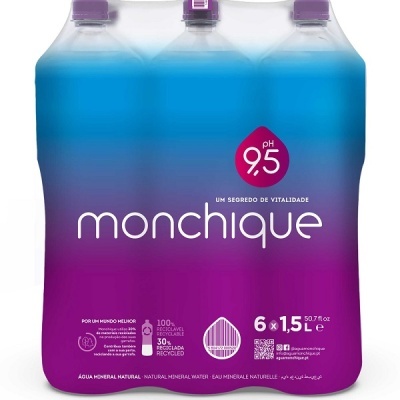 Pack de água mineral natural Monchique com pH 9,5 em embalagem plástico azul e roxa