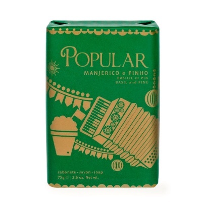 Sabonete verde com texto e ilustrações douradas