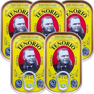 Cinco latas amarelas de filete de atum TENORIO com imagem de homem e texto em português