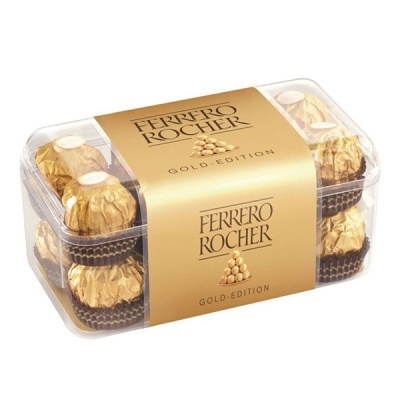 Caixa transparente de bombons Ferrero Rocher Gold Edition com rótulo dourado.
