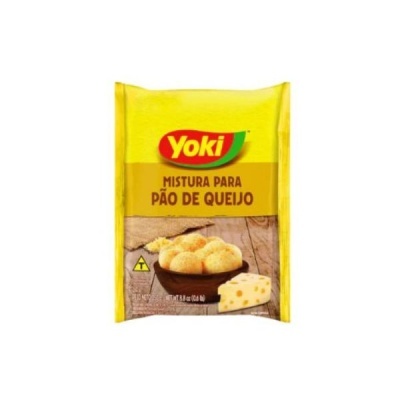 Pacote amarelo de mistura para pão de queijo Yoki com imagem do produto e queijo.