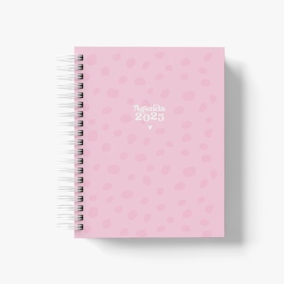 Caderno espiral cor-de-rosa com texto 'Agenda 2023'