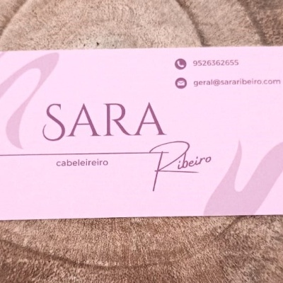 Cartão de visita para cabeleireiro sobre tecido castanho