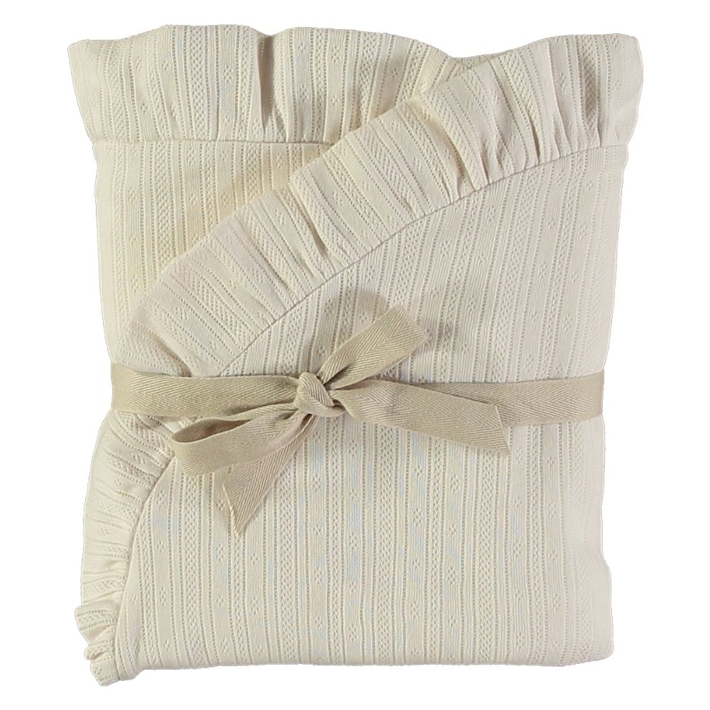 Manta creme de malha com padrão e fita amarrada