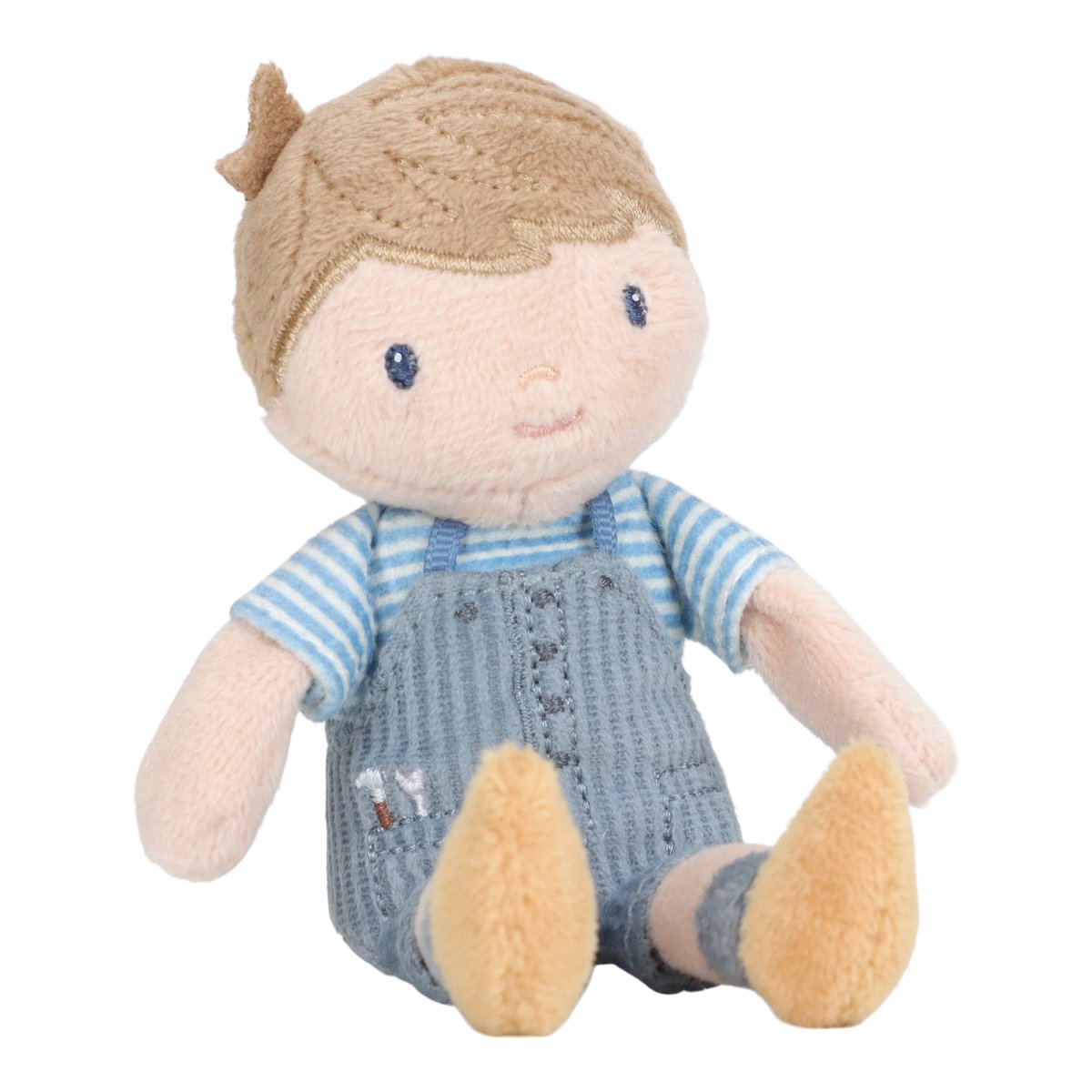 Boneco de peluche de criança com roupa azul sentado