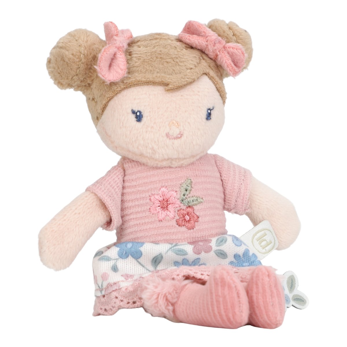 Boneca de peluche com vestido rosa e saia florada