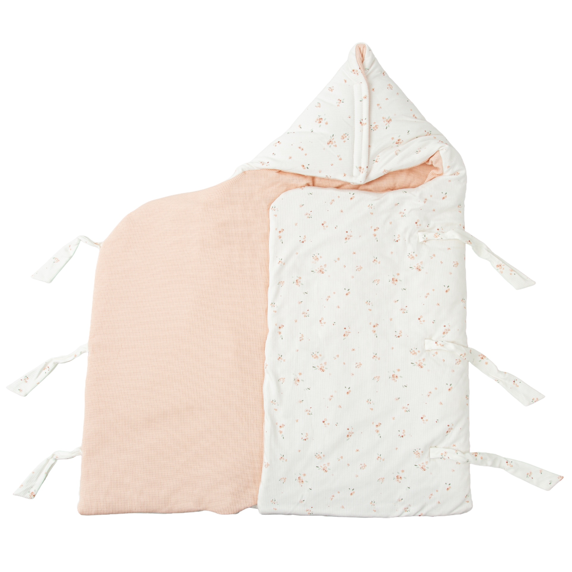 Sacola de bebé branca com padrão floral cor-de-rosa e interior cor de pêssego.