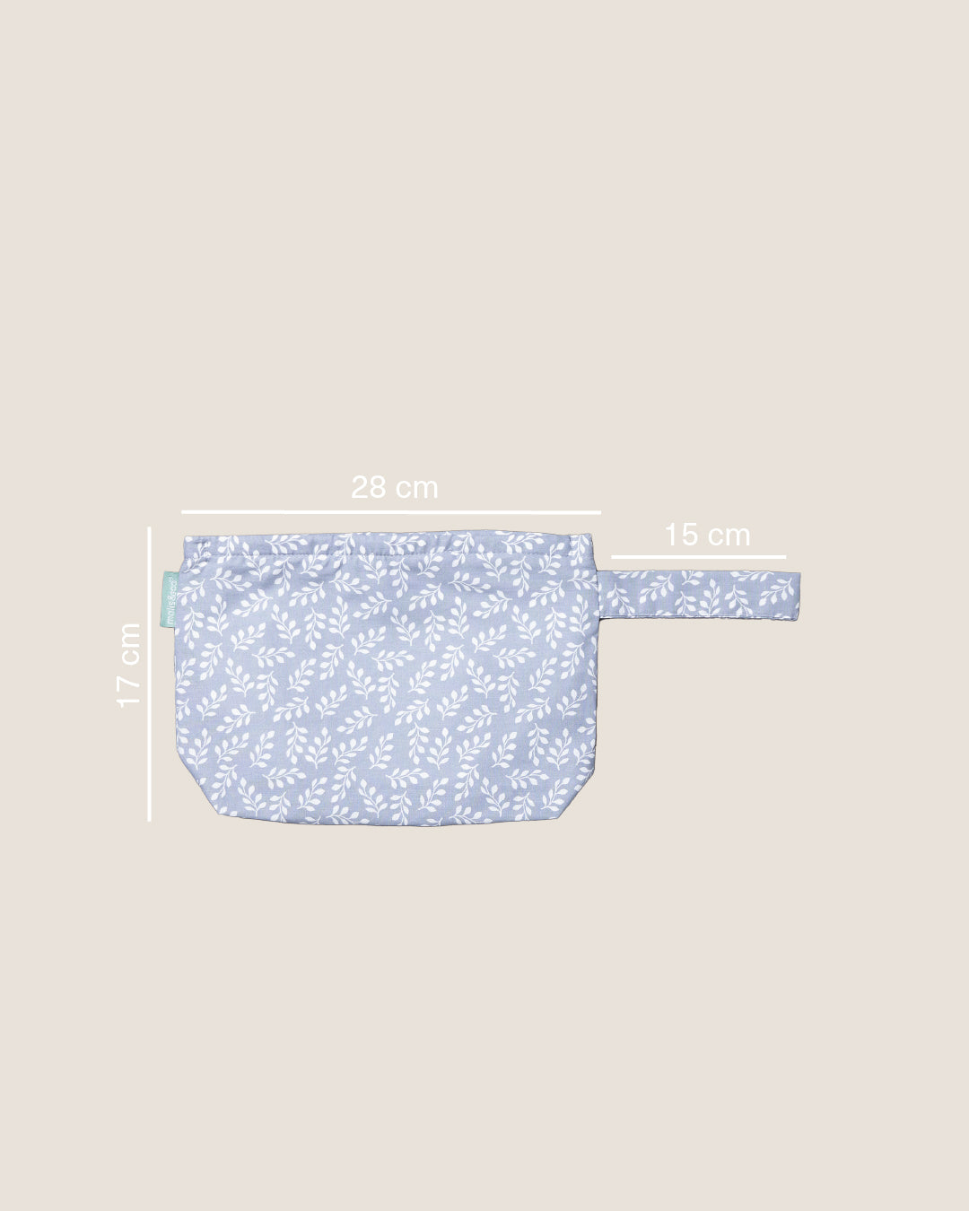 Bolsa de tecido azul claro com padrão branco de folhas e alça lateral, com dimensões indicadas.