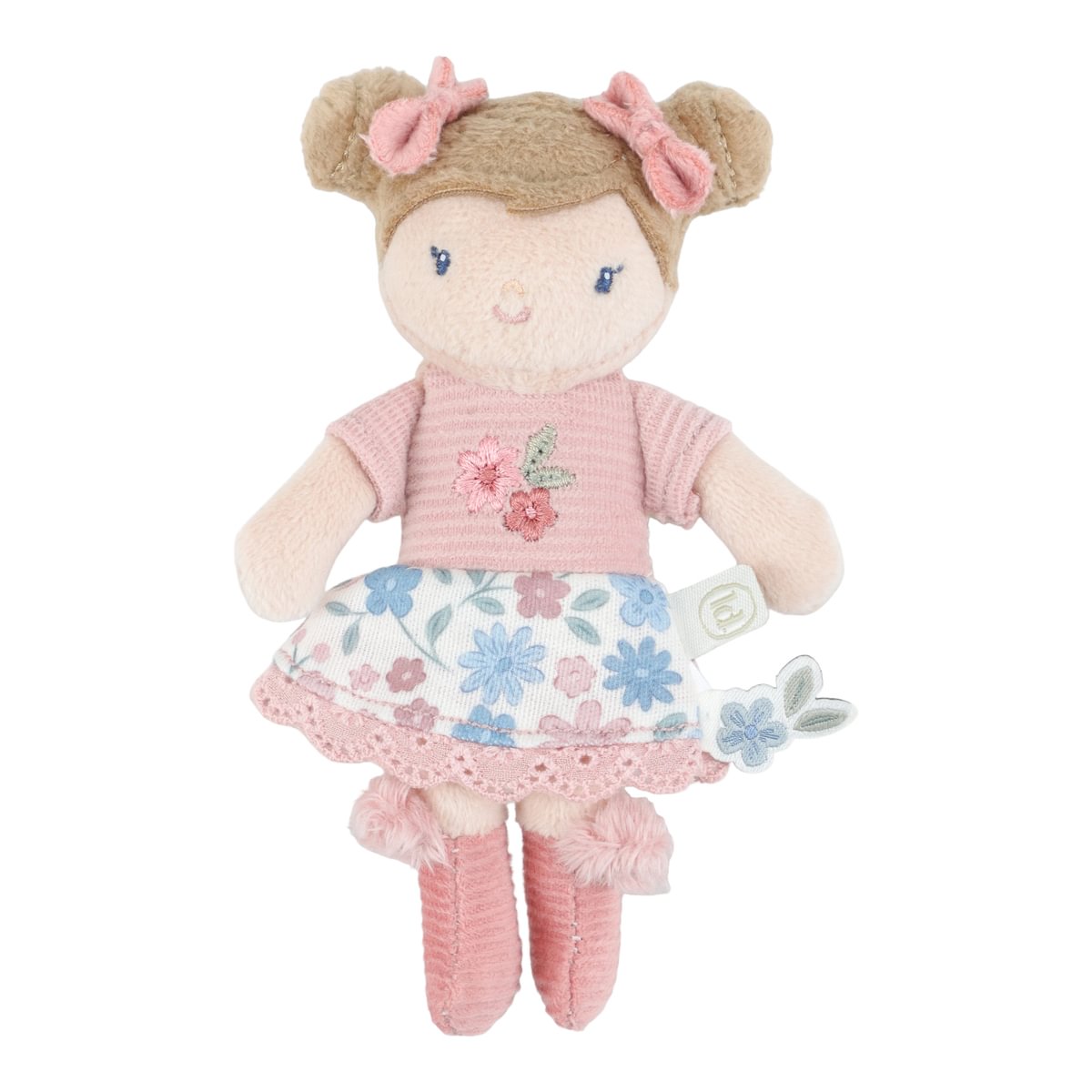 Boneca de peluche com vestido e botas cor de rosa e padrão floral na saia
