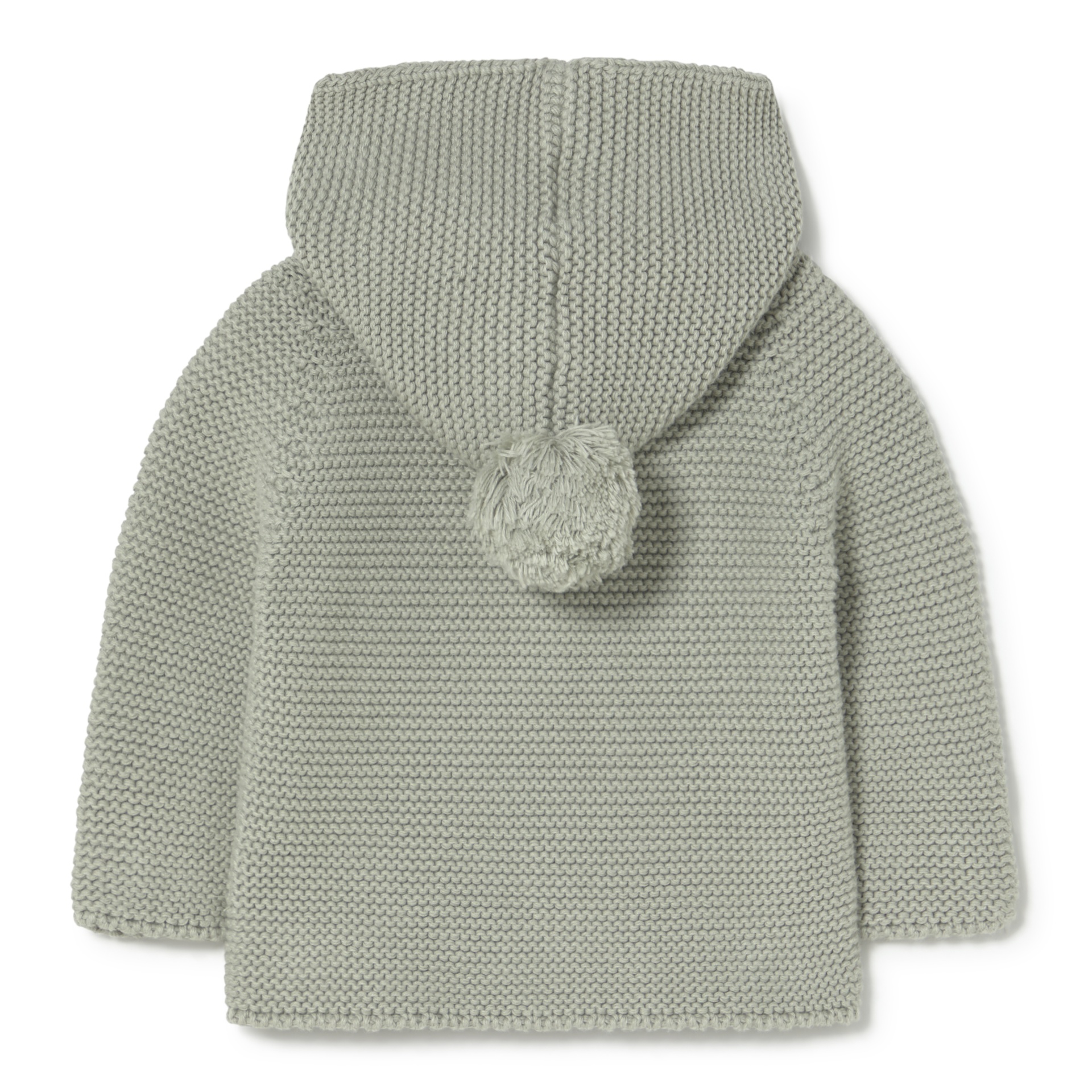 Casaco de malha cinzento claro com capuz e pompom atrás.