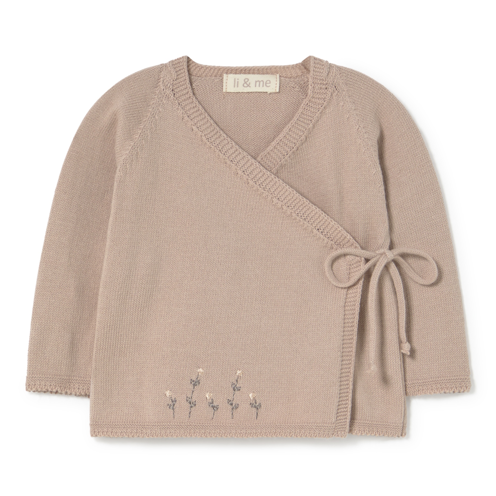 Casaco de bebé em malha bege claro com laço lateral e flores bordadas.