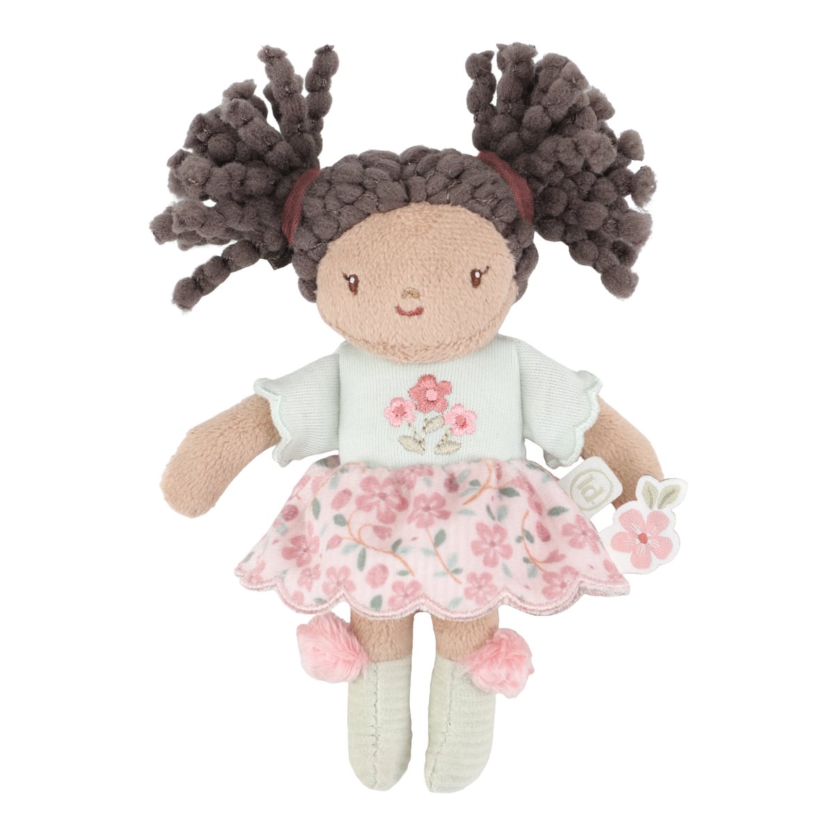 Boneca de peluche com vestido floral cor-de-rosa e cabelo castanho