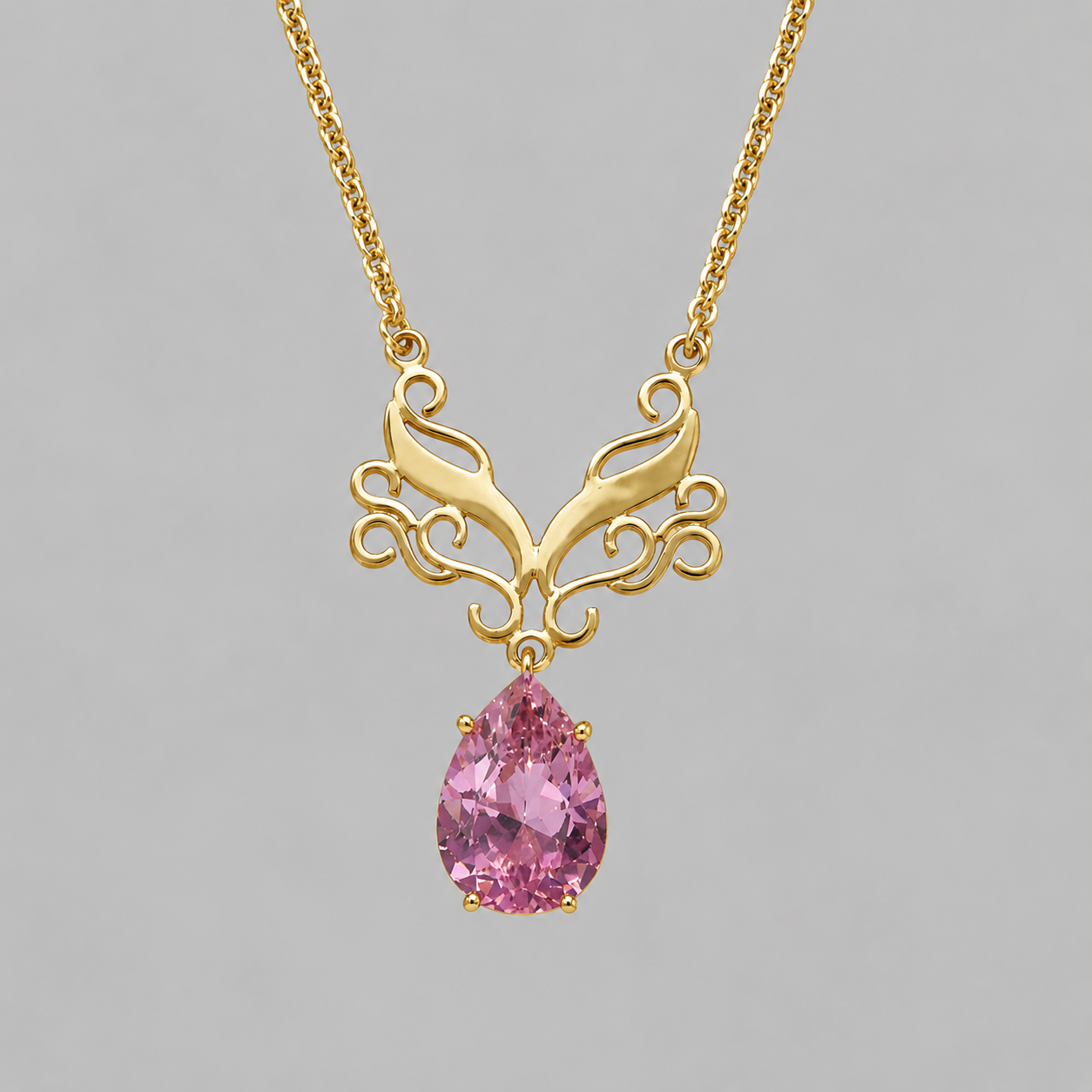 Colar Ramos de Queirós Menor Colar em ouro amarelo com pendente ornamental e pedra rosa em gota