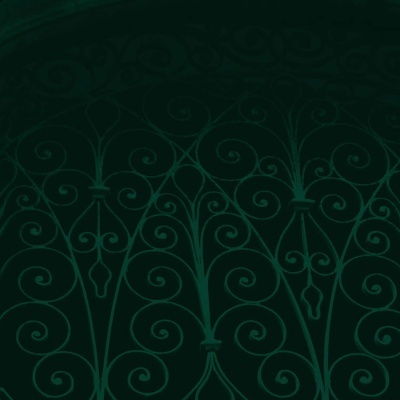 Padrão decorativo verde com arabescos e espirais