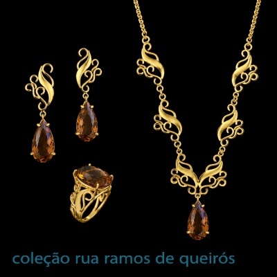 Conjunto de joalharia em ouro amarelo e pedras castanhas