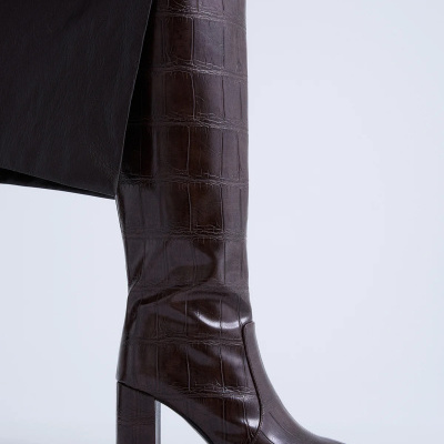 https://www.anajosapataria.com/product/bota-cano-alto-exe-fieeira-444-brown